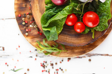 Cherry, tarragon, chili pepper, basil, spices Ingredients for cooking pasta. Food background on a white table