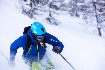 Fototapeta na wymiar freeride skier skiing downhill