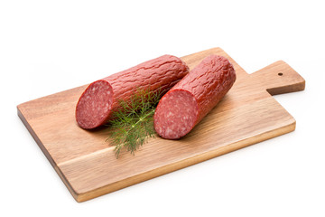 Salami smoked sausage, basil leaves on white background cutout.