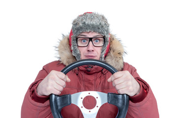 Frozen man in red winter clothes with a steering wheel, isolated on white background. Concept car driver