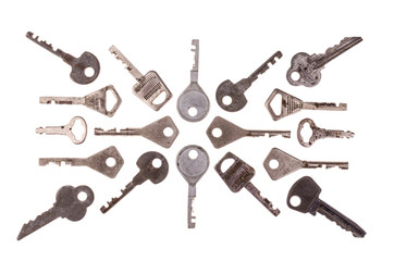 Old vintage keys isolated on white background. Several types of old retro keys. Set of old keys. Composition of different keys.