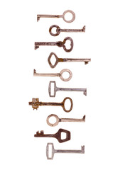 Old vintage keys isolated on white background. Several types of old retro keys. Set of old keys. Composition of different keys.