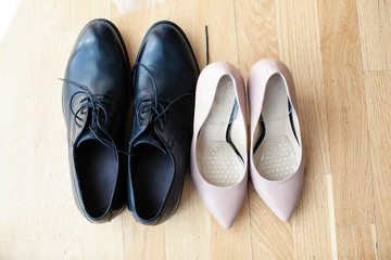 shoes of the bride and groom near. View from above