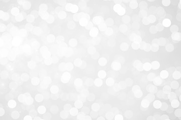 gray bokeh White and Silver lights on bokeh abstract background.