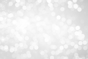 gray bokeh White and Silver lights on bokeh abstract background.
