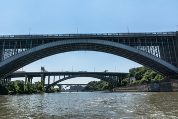 View of Washington Bridge, Hamilton Bridge and High Bridge from the Harlem River, Manhattan, NYC