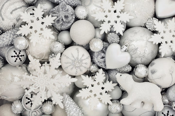 White and silver christmas decorations with star, polar bear, snowflake, balls, pine cone and heart...