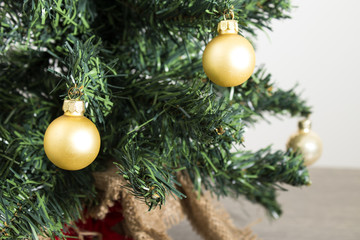 Detailed green christmas tree with gold decorations