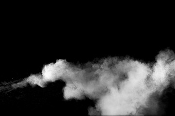 Explosion of white dust on black background.