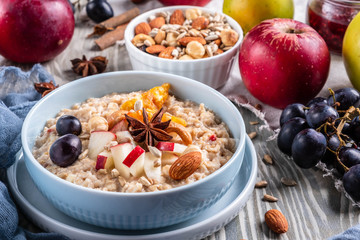 oatmeal with fruit and nuts, healthy breakfast