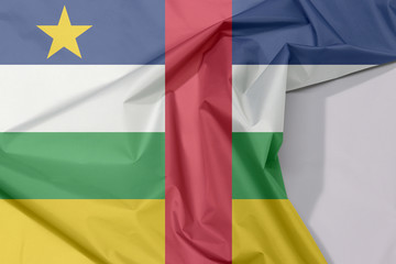 Central African fabric flag crepe and crease with white space, blue white green yellow and red color with star.