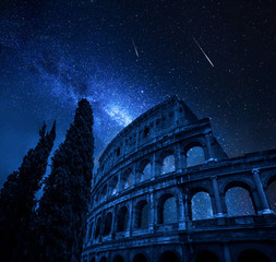 Colosseum in Rome with milky way and falling stars, Italy
