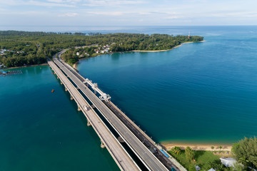 Fototapeta na wymiar Aerial drone shot of bridge with cars on bridge road image transportation background concept