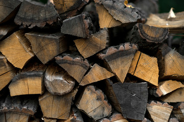 logs wooden log houses neatly stacked as a background and natural texture