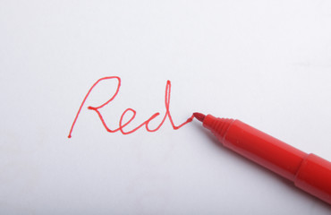 Red marker on white paper