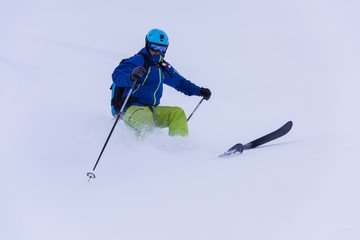 Fototapeta na wymiar freeride skier skiing downhill
