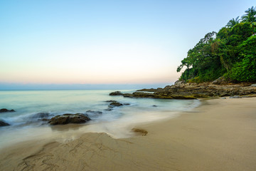 Fototapeta na wymiar Tropical beach at sunset