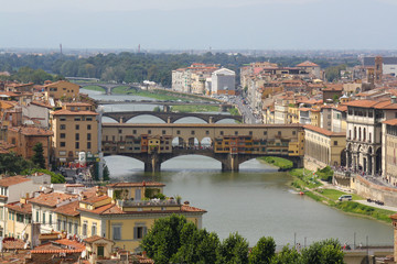 Fototapeta na wymiar View of Ponte Vecchio over Arno river in Florence, Italy