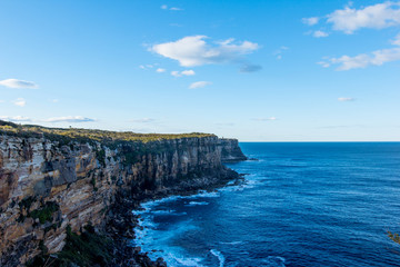 Fototapeta na wymiar Coastal cliff deep blue ocean