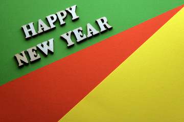 Photo for new year on the green red yellow background.