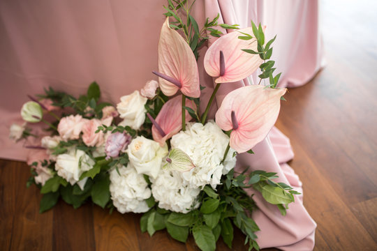 Flowers Decoration Boquet Lay On Floor At Table With Pink Tablecloth