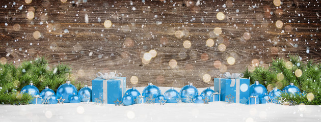 Blue christmas baubles and gifts lined up 3D rendering