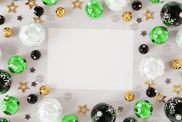 Christmas card mockup with green baubles 3D rendering