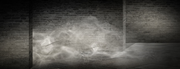 Background of an empty corridor, basement, tunnel with brick, old walls and highlights of light. Brick walls, glow, smoke. Dark gloomy empty background.