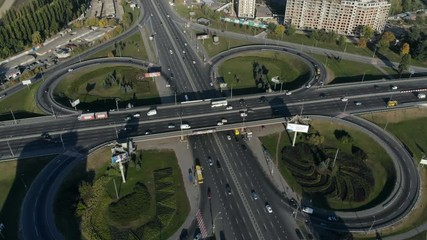 drone rises above traffic intersection