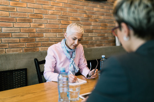 Beautiful Senior Businesswoman Happy And Satisfied After Conducting A Job Interview.