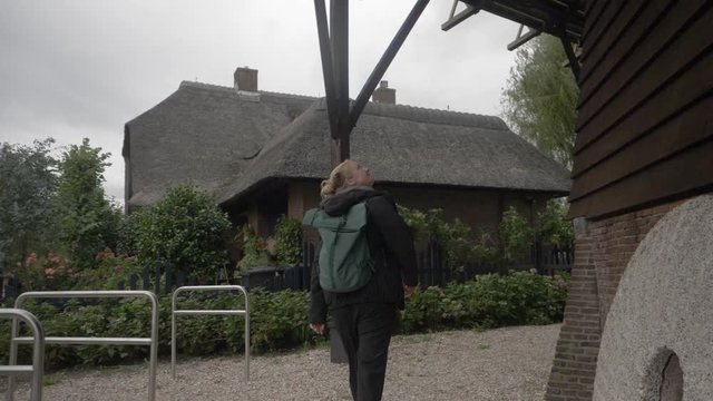 A Young Female Backpacker on a Trip to the Netherlands