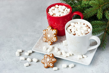 Ceramic mugs with hot chocolate and marshmallows