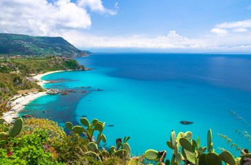 Cape Capo Vaticano Ricadi aerial view from cliffs platform, sandy beach, green mountains, Sicilia...