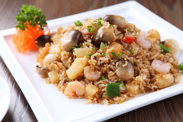 Fototapeta na wymiar Fried rice with shrimp and straw mushroom