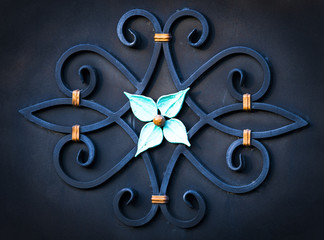 Details, structure and ornaments of forged iron gate.