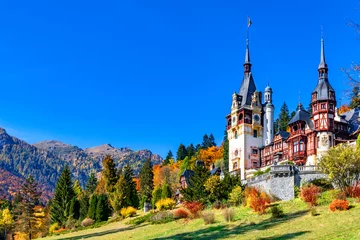 Foto op Canvas Peles Castle, Sinaia, Prahova County, Romania: Famous Neo-Renaissance castle in autumn colours, at the base of the Carpathian Mountains, Europe © davidionut