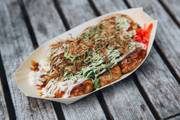 Takoyaki on wood background