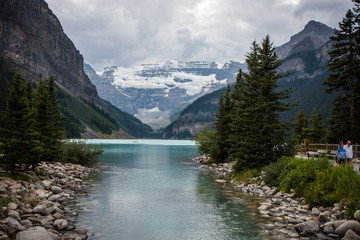Naklejka na ściany i meble View of Lake Louise in Banff National Park on a cloudy overcast day in Canada