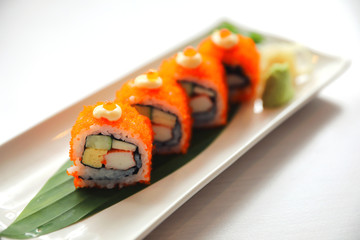 California rollsl sushi with egg cucumber avocado cream cheese red caviar Sushi menu. Japanese food. American style