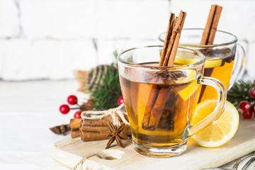 Fotobehang Thee Winter hot tea with lemon and spices