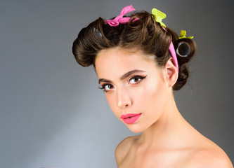Naklejka premium vintage woman with fashion makeup and long curly hair. Fashion portrait of retro woman. Beauty salon and hairdresser. Makeup cosmetics and skincare. pinup girl with glamour makeup, copy space