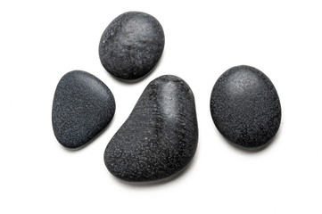 Fototapeta na wymiar Four big black pebbles