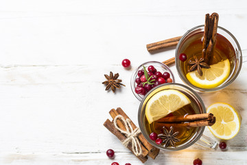 Autumn hot tea with lemon and spices