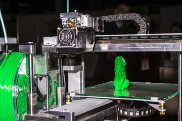 Electronic three dimensional plastic printer during work , 3D printer.