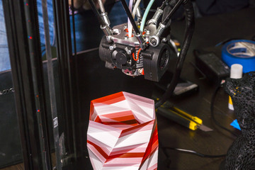 Electronic three dimensional plastic printer during work , 3D printer.