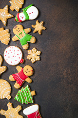 Fototapeta na wymiar Christmas gingerbread on dark background.
