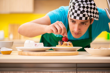 Man cook preparing cake in kitchen at home