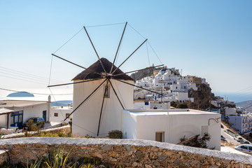 View of Chora and windmill in foreground. Serifos island, Greece © vivoo