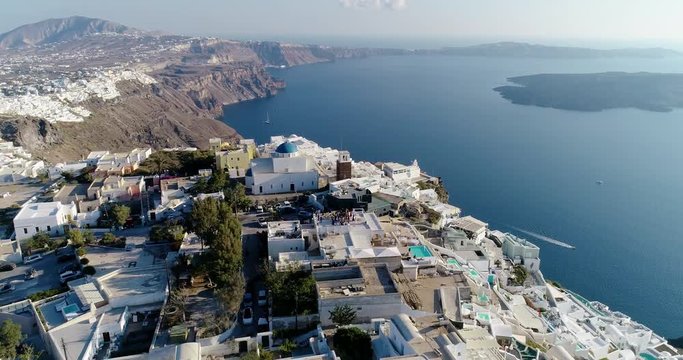 village with villa on the island of Santorin in aerial view, greece