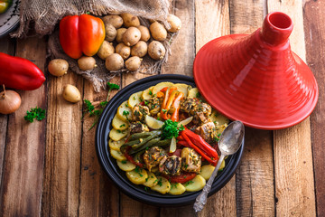 Chermoula fish tajine with bell peppers, moroccan cousine.
